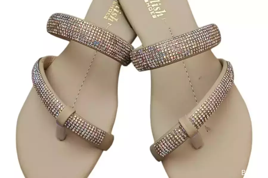 Step out in style with our Women's PU Leather Fancy Flats. Designed with elegance and comfort in mind, these embellished flats are perfect for any occasion. Available in classic ivory, they come in sizes 6 to 10, ensuring a perfect fit for everyone.